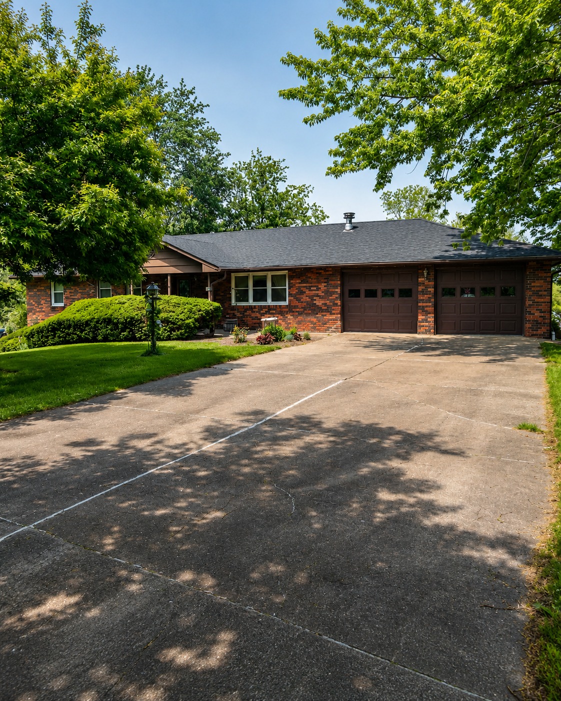 Classic brick ranch home with a walkout basement in Columbia, Missouri.